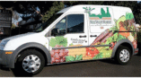 white van wrap with produce and market logo 