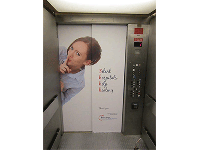 hospital elevator graphic urging silence