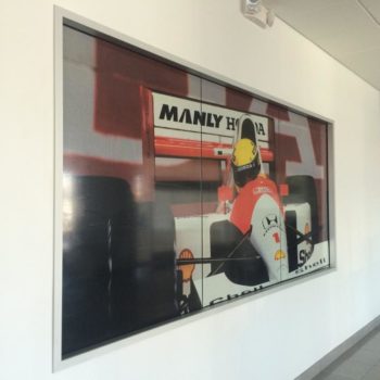 Window graphic of race car and driver