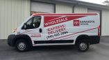 White and Red Vehicle Wrap Custom Vinyl Wrap on Van in Sarasota Florida with Speed Pro Imaging