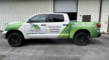 Custom Vehicle Wrap White and Green Vinyl Wrap in Sarasota Florida by Speed Pro Imaging