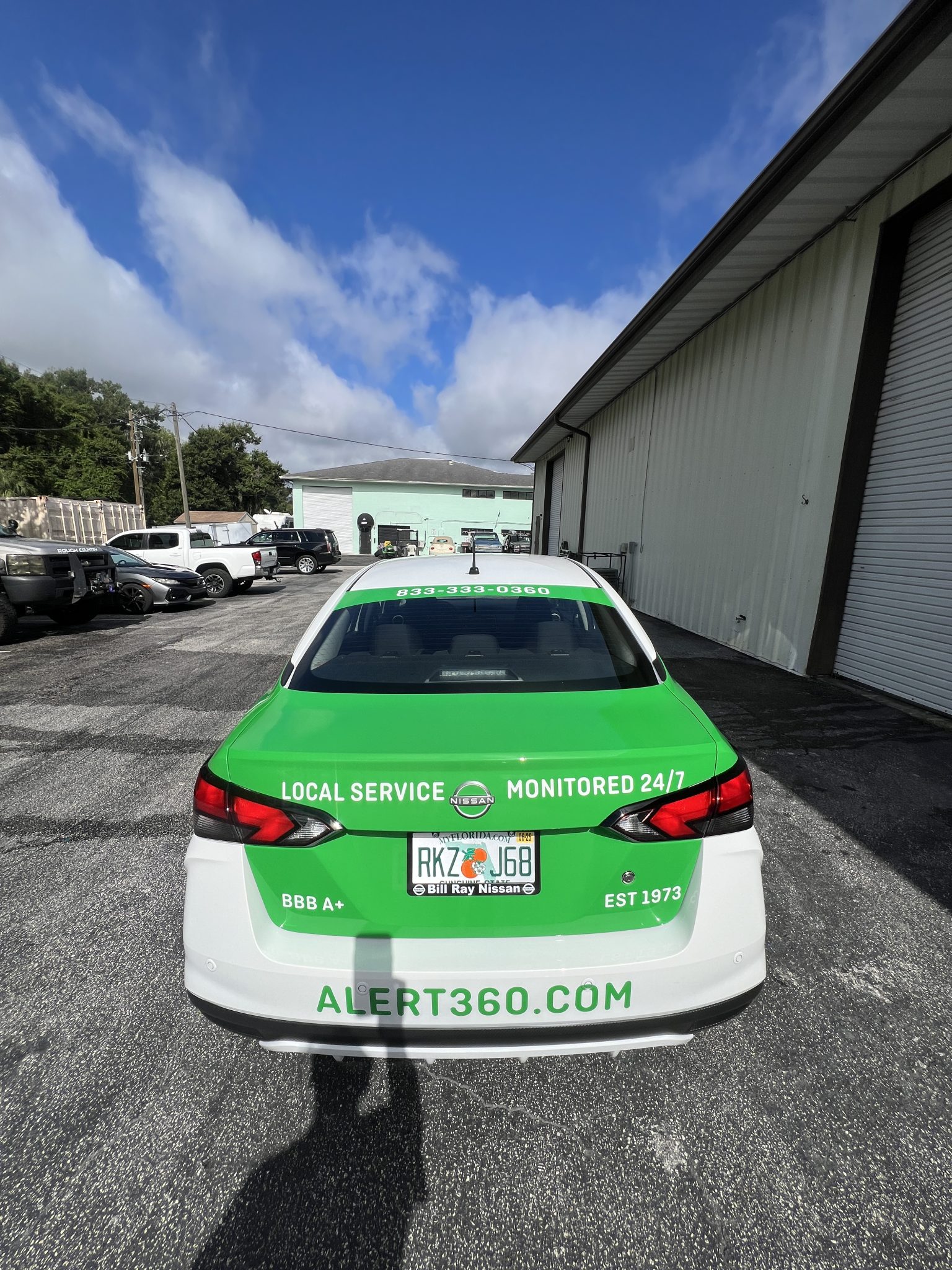 Commercial vehicle wrap for Alert 360 featuring custom printed graphics and branded vehicle advertising designed for high-visibility mobile marketing.