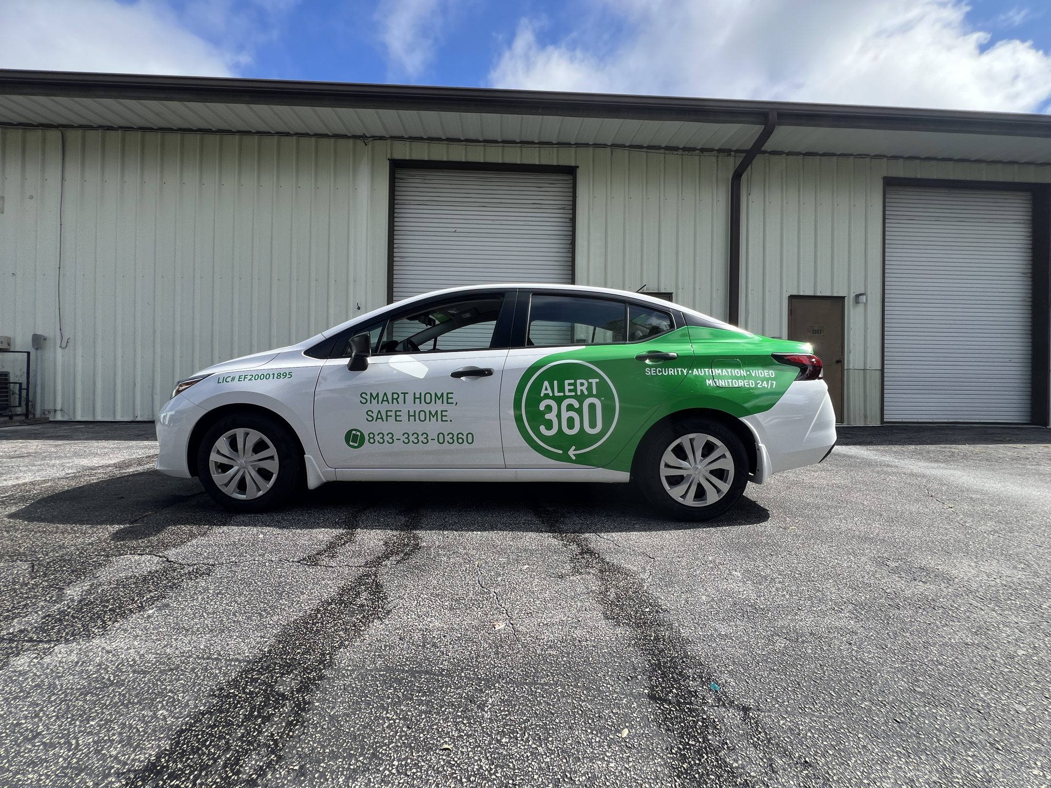 Custom commercial vehicle graphics for Alert 360 featuring full-color branded wrap elements professionally installed for fleet branding and mobile advertising.