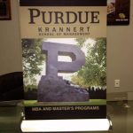 small table-top banner for Purdue Krannert School of Management's MBA & master's programs