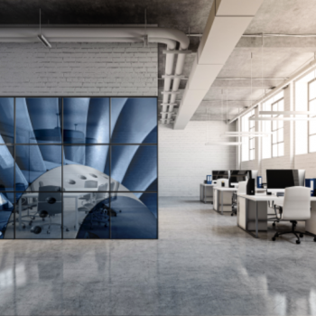 conference room with interior glass walls that have blue wavy graphics