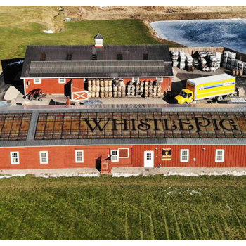 Barn that says "Whistlepig" across the roof