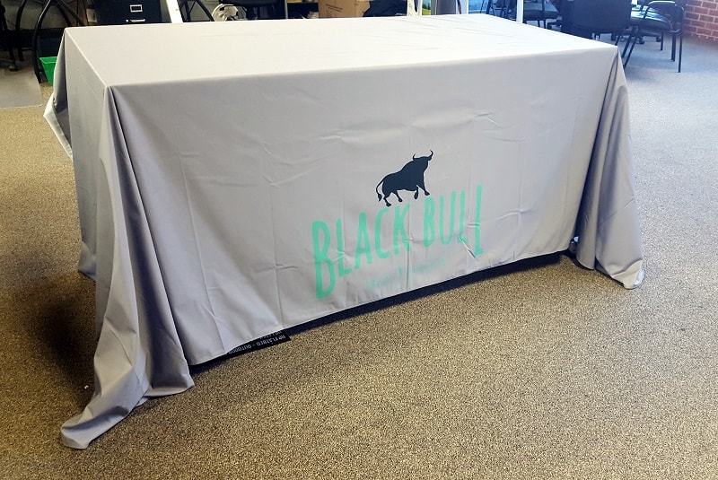 Sleek black table cover with bull design