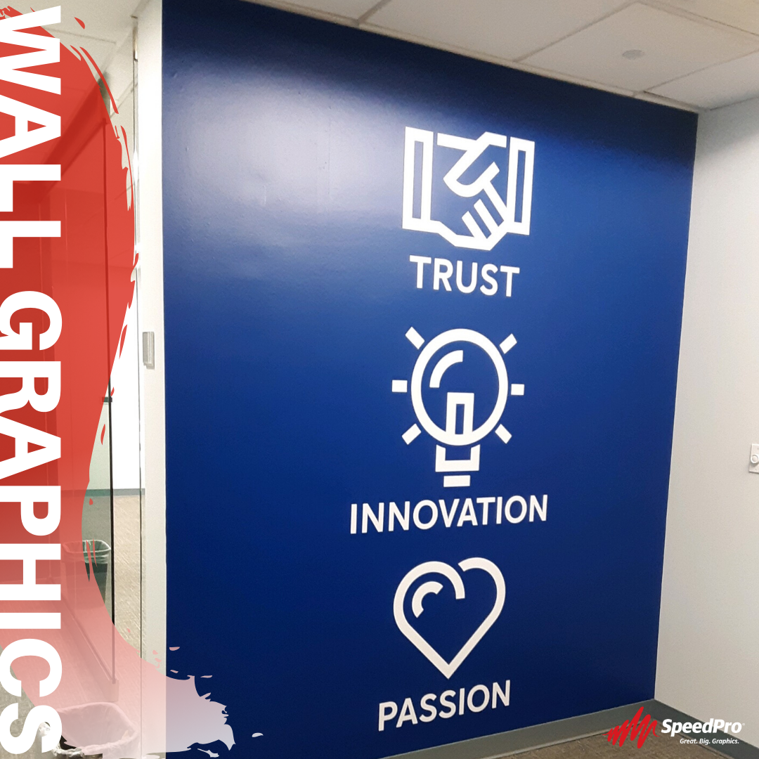 Blue wall with hands shaking with “trust”, lightbulb with “innovation”, and a heart with “passion” all in white.