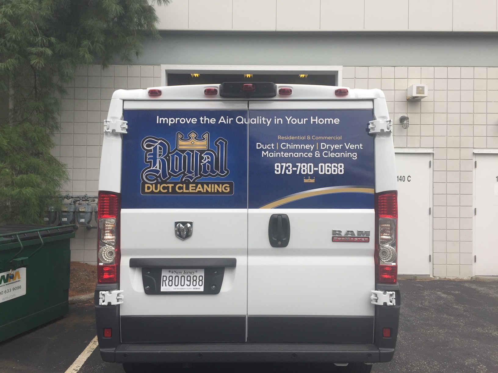 Back of white van with blue wrap that says Royal Duct Cleaning and Improve the Air Quality in Your Home.