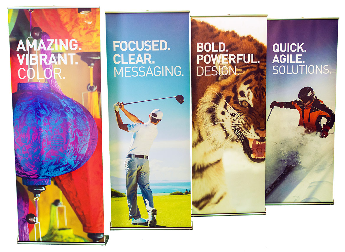 Banners with a purple Chinese lantern, a man playing golf, a tiger and a man skiing all placed in a white room.