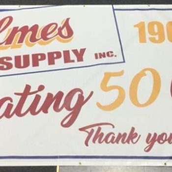 Holmes drywall 50 years outdoor sign