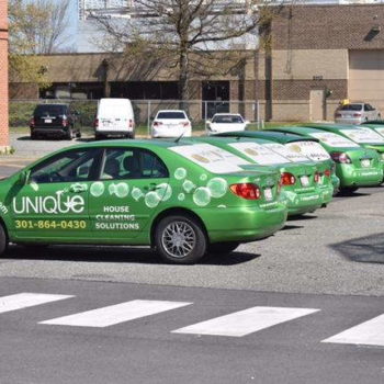 Group of cars featuring unique house cleaning solutions green vehicle wrap