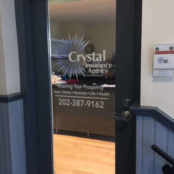 Crystal insurance agency window graphic on glass door