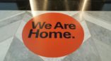 We are home red circle floor decal 