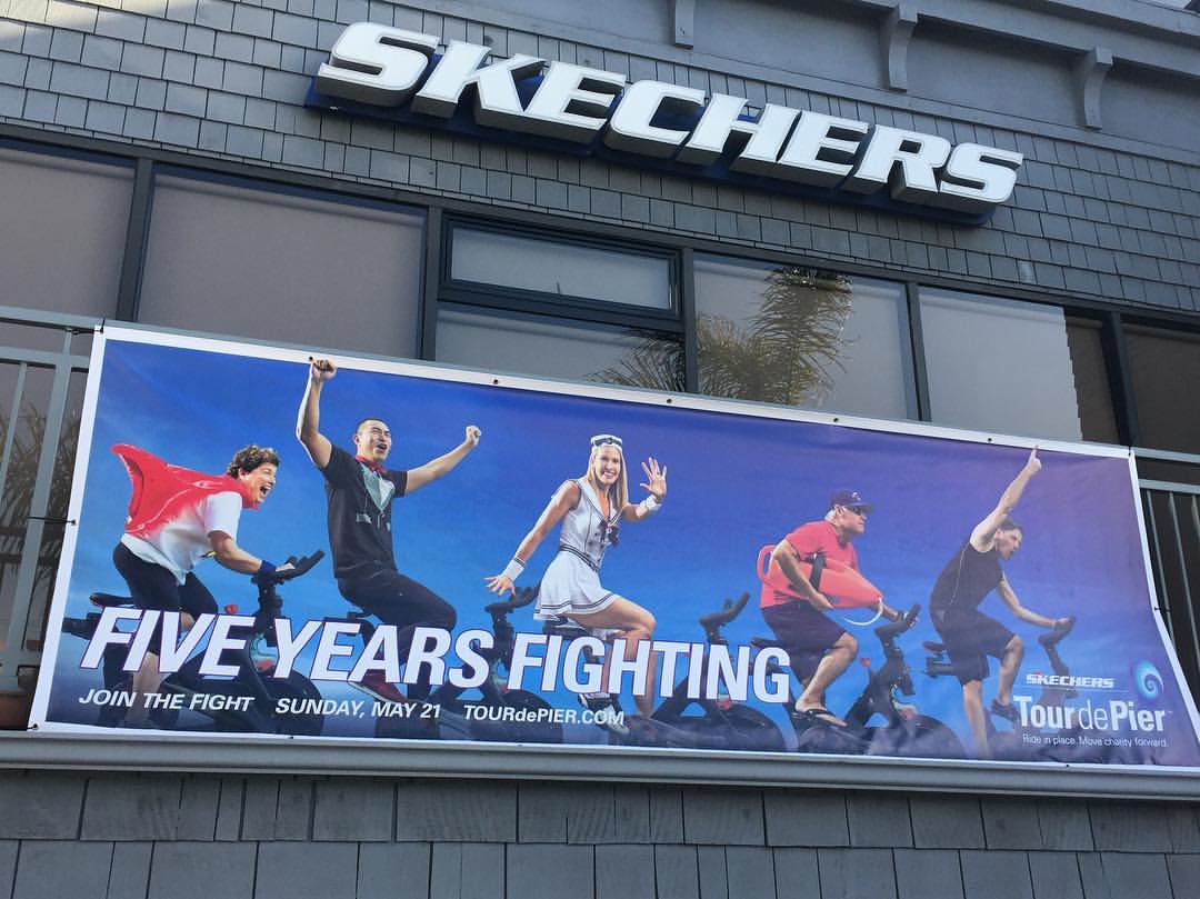 Advertising sign displayed on building exterior