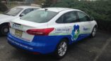 Master Tech blue and white car wrap 