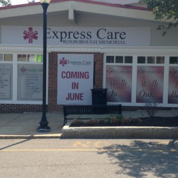 Express Care window graphics for opening office 