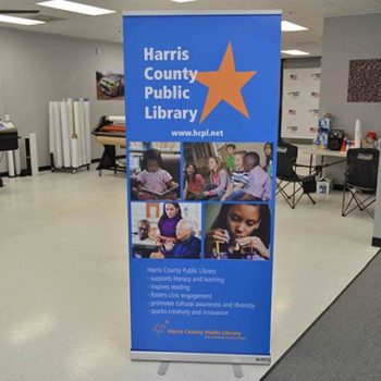 Harris County Public Library blue retractable sign 