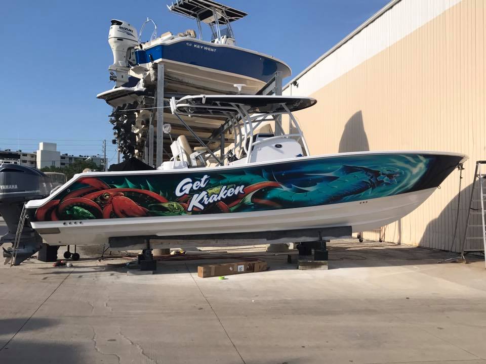 boat wrap with shark and angry octopus 