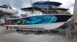 boat wrap with shark and angry octopus 