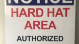 Sign with text notice hard hat area authorized personnel only