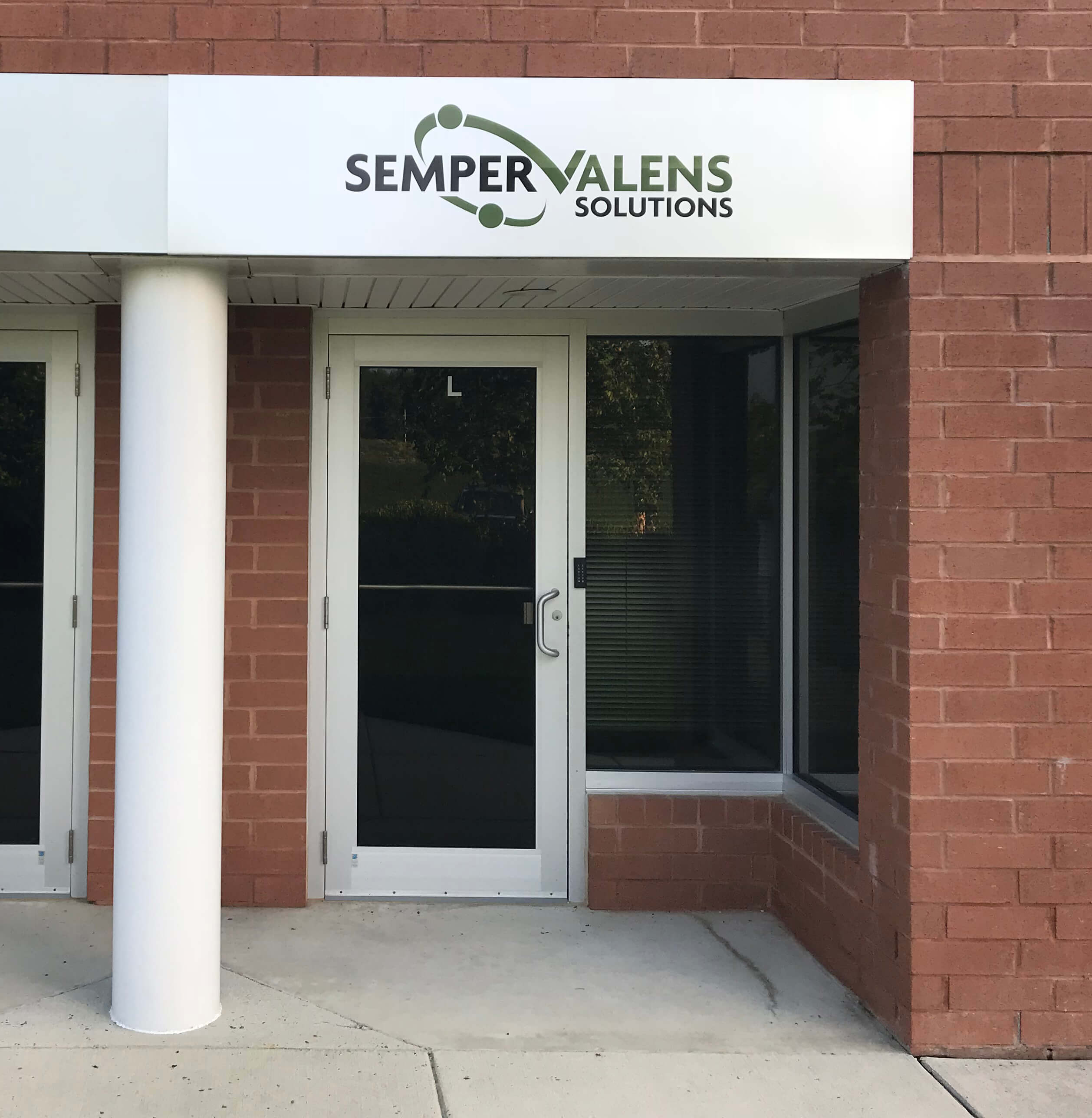 Semper Valens Solutions outdoor sign
