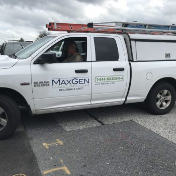Car decal for MaxGen Energy Services on a white truck created by SpeedPro 