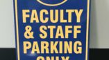 Signs for faculty & staff parking created by SpeedPro Towson 