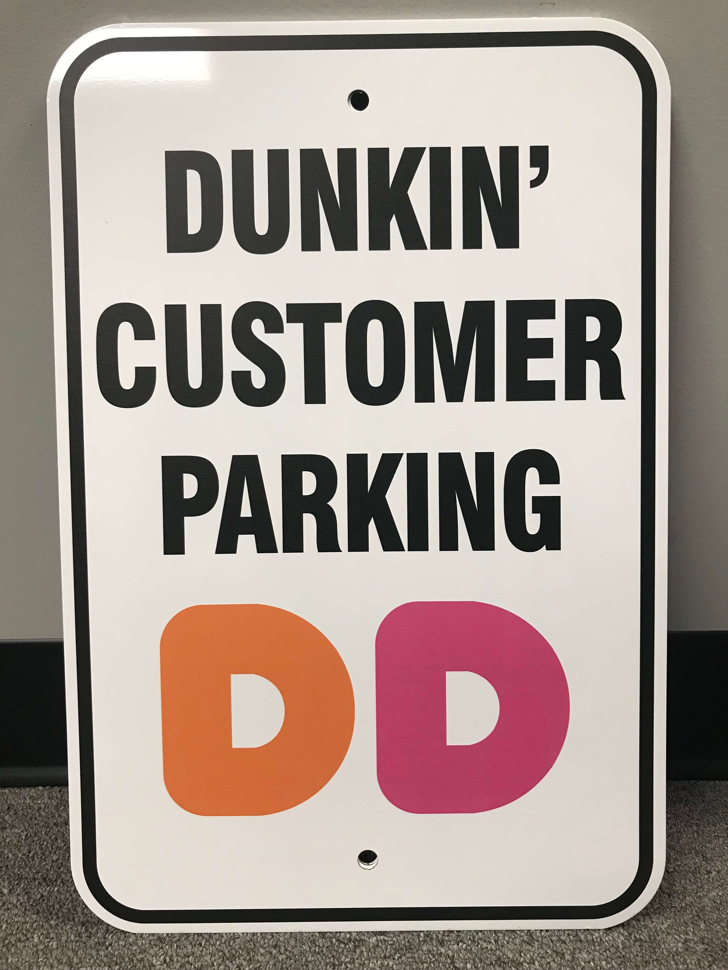 Dunkin' Customer Parking sign