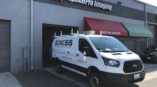 Genesis Corporation Branded Work Van