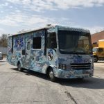 Blue Line K-9 Dog Training Branded Camo Bus