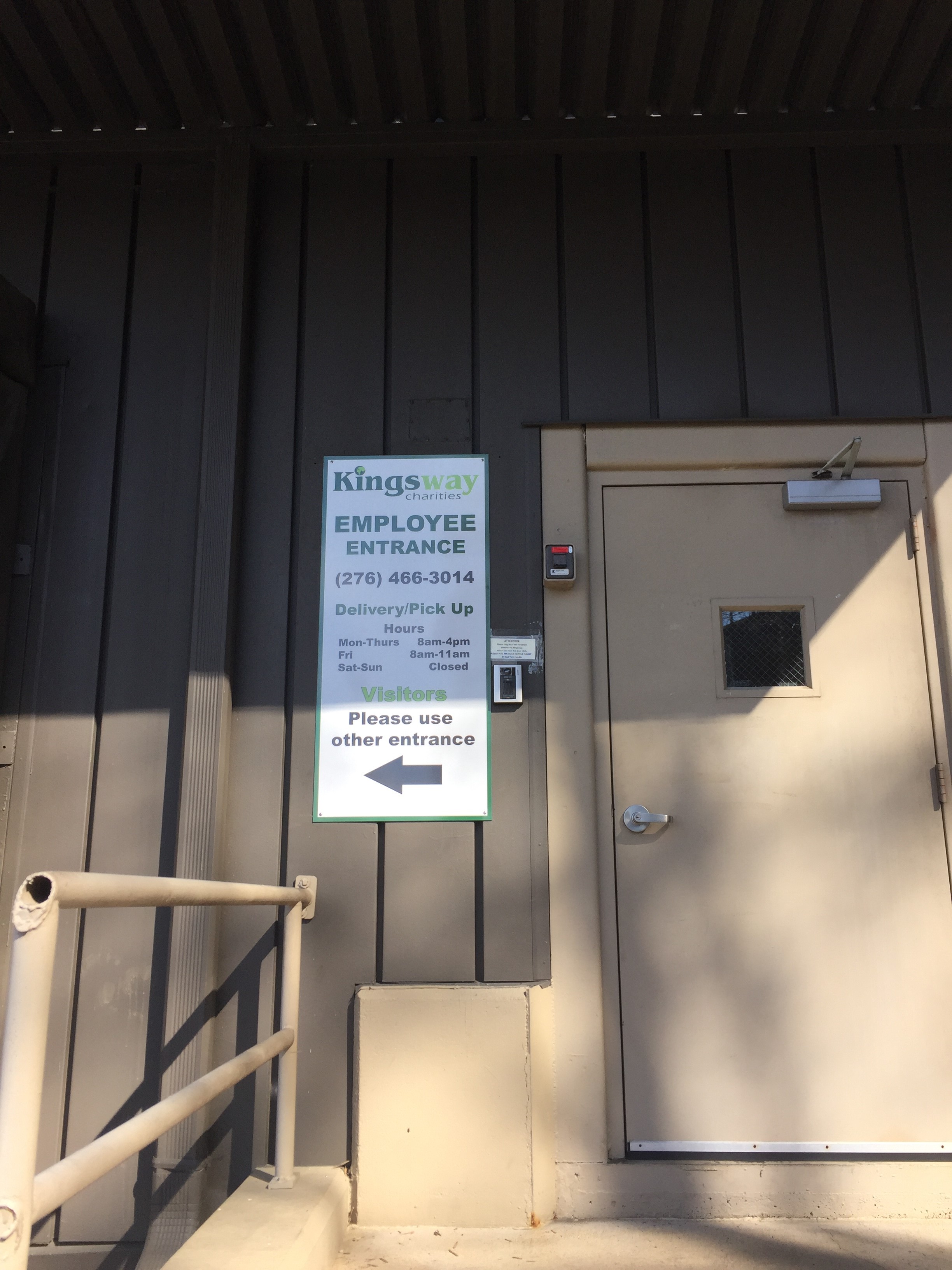Kingsway Charities employee entrance sign with operating hours