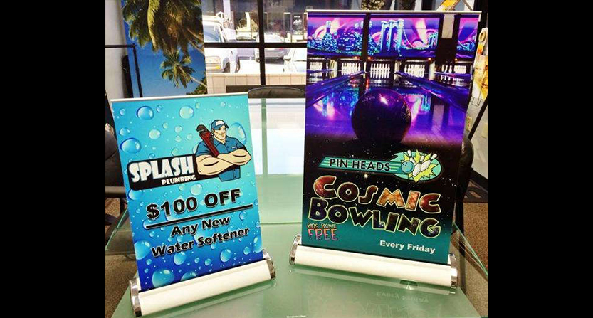 retractable banners for bowling alley and plumbing service