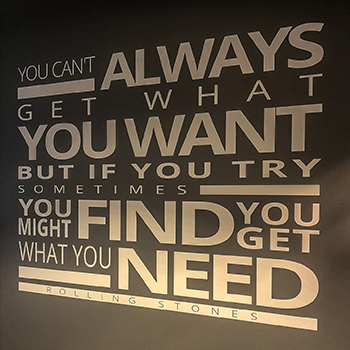 rolling stones quote on a wall