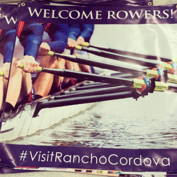 banner of people rowing