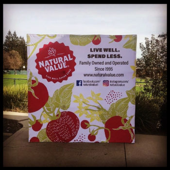 standing banner advertising Natural Value