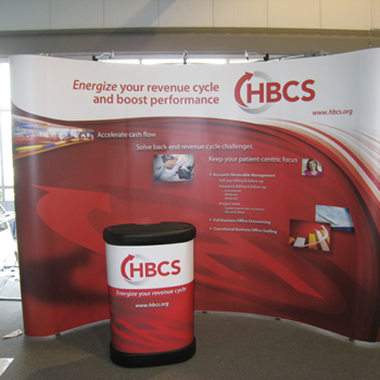 A tradeshow display and podium stand for HBCS.