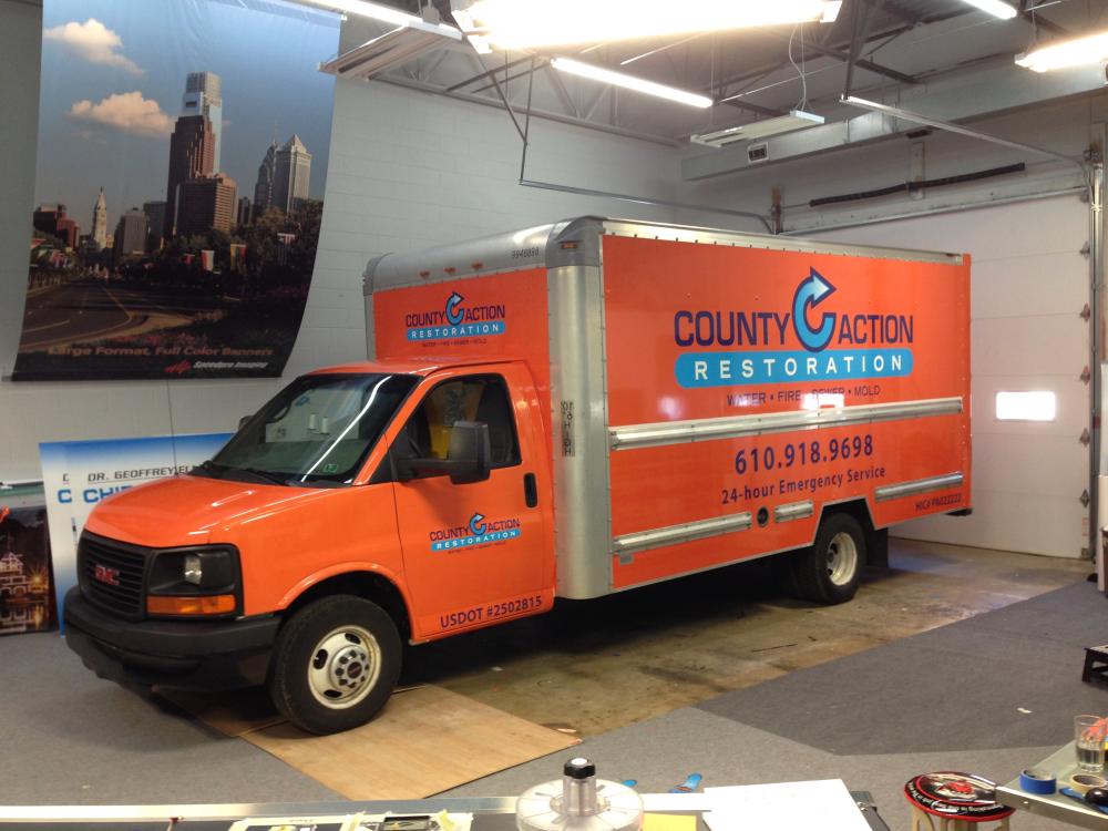 County Action Restoration vehicle wrap