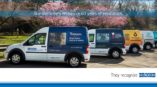 A fleet of vehicles with custom designed vehicle wraps for Brooks Courier.