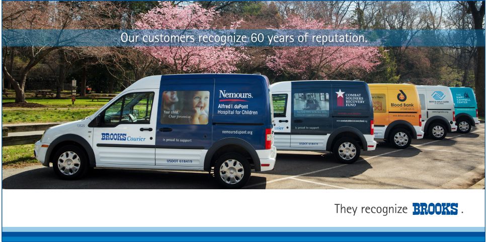A fleet of vehicles with custom designed vehicle wraps for Brooks Courier.