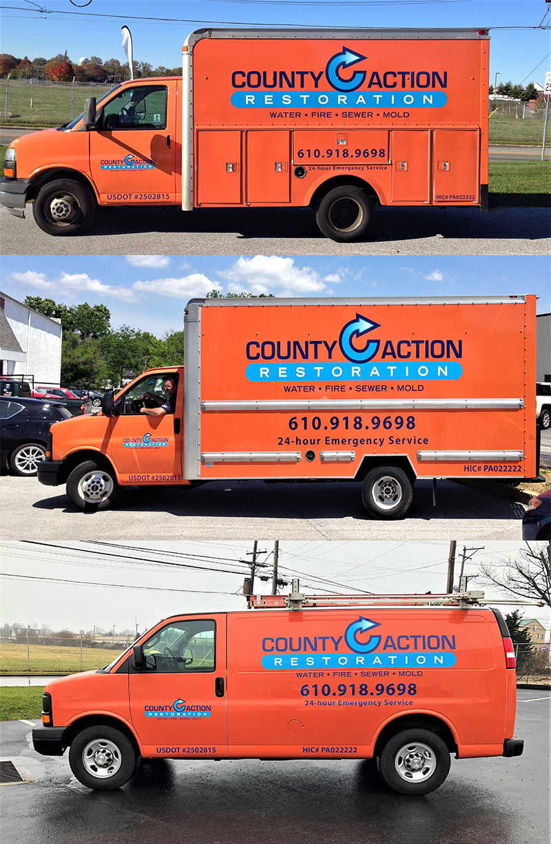 A fleet of box trucks and a van with custom designed vehicle wraps for County Action Restoration.