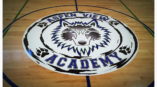 Graphic in the middle of a basketball court of Aspen View Academy. 