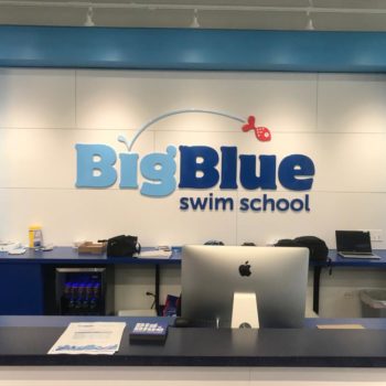 Swim school reception dimensional signage
