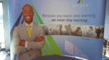 Trade show backdrop for Becker featuring a smiling professional and motivational quote on a blue and green design.