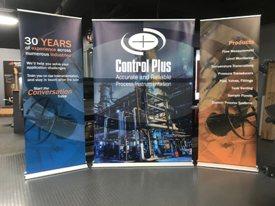 Control Plus trio banner stands at trade show