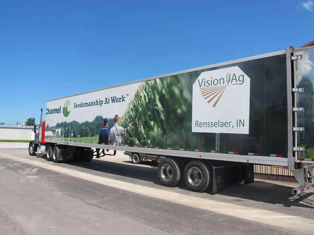 Full trailer wrap for Vision Ag featuring Channel branding, agricultural imagery, and the location Rensselaer, IN.