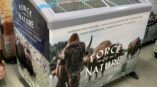 Freezer display with 'Force of Nature' branding featuring a bison image and text promoting grass-fed and nutrient-dense meat.