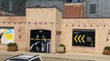 Window graphics for EY Entrepreneur Of The Year displayed on a brick building in an urban setting.