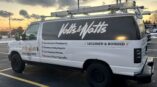 Full van wrap for Volts & Watts featuring company services and contact information displayed on the side.