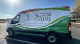 Full van wrap for Above and Beyond Free Food Pantry with green and white graphics featuring a tree design.